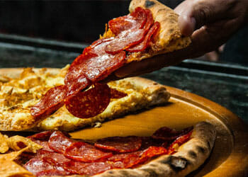 A plate full of pizza