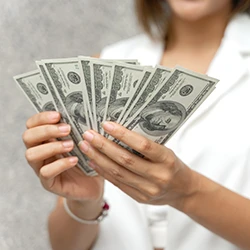 A woman counting her money