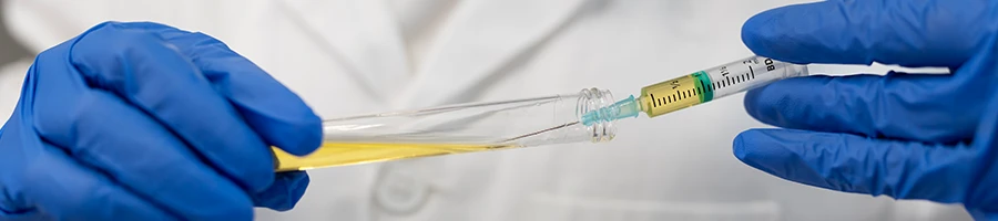 A doctor getting a sample of urine