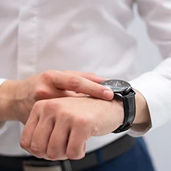 A man checking the timing closely